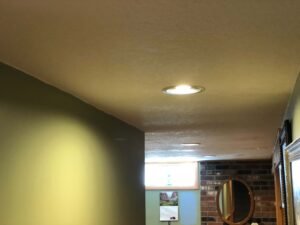 basement with knockdown texture on ceiling